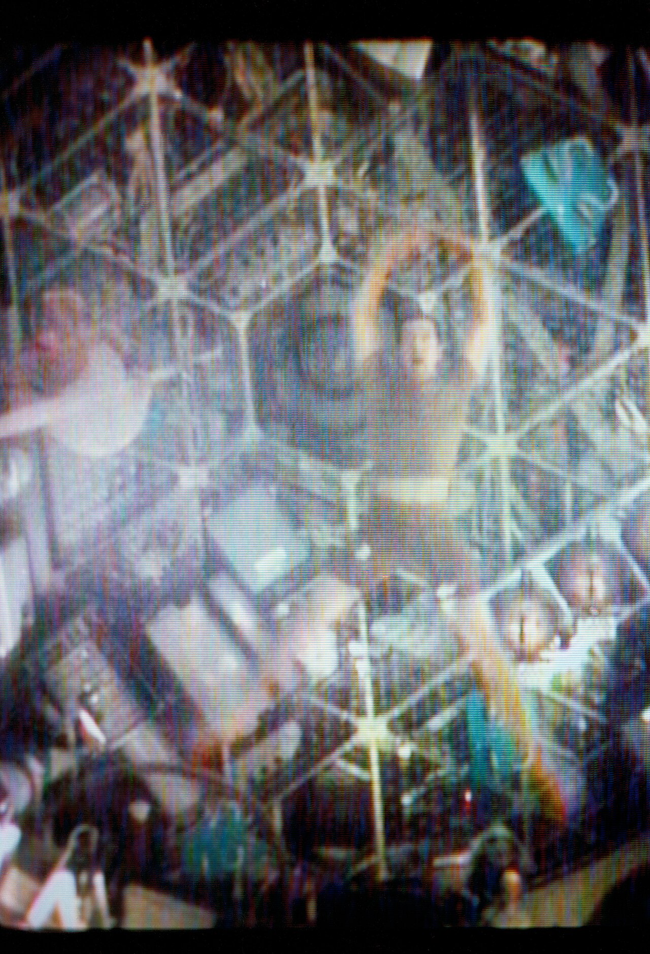 An astronaut floating aboard a spacecraft