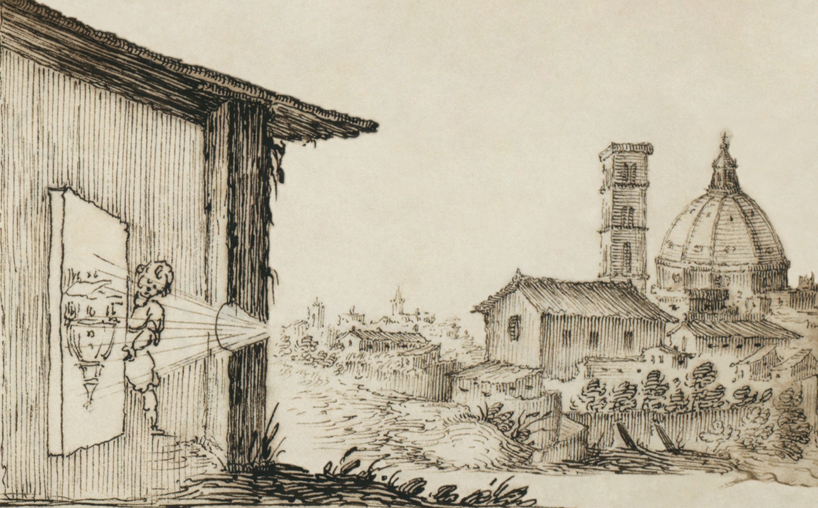 An old drawing of a camera obscura: light through a small hole projects an upside-down image of the town outside onto an inside wall.