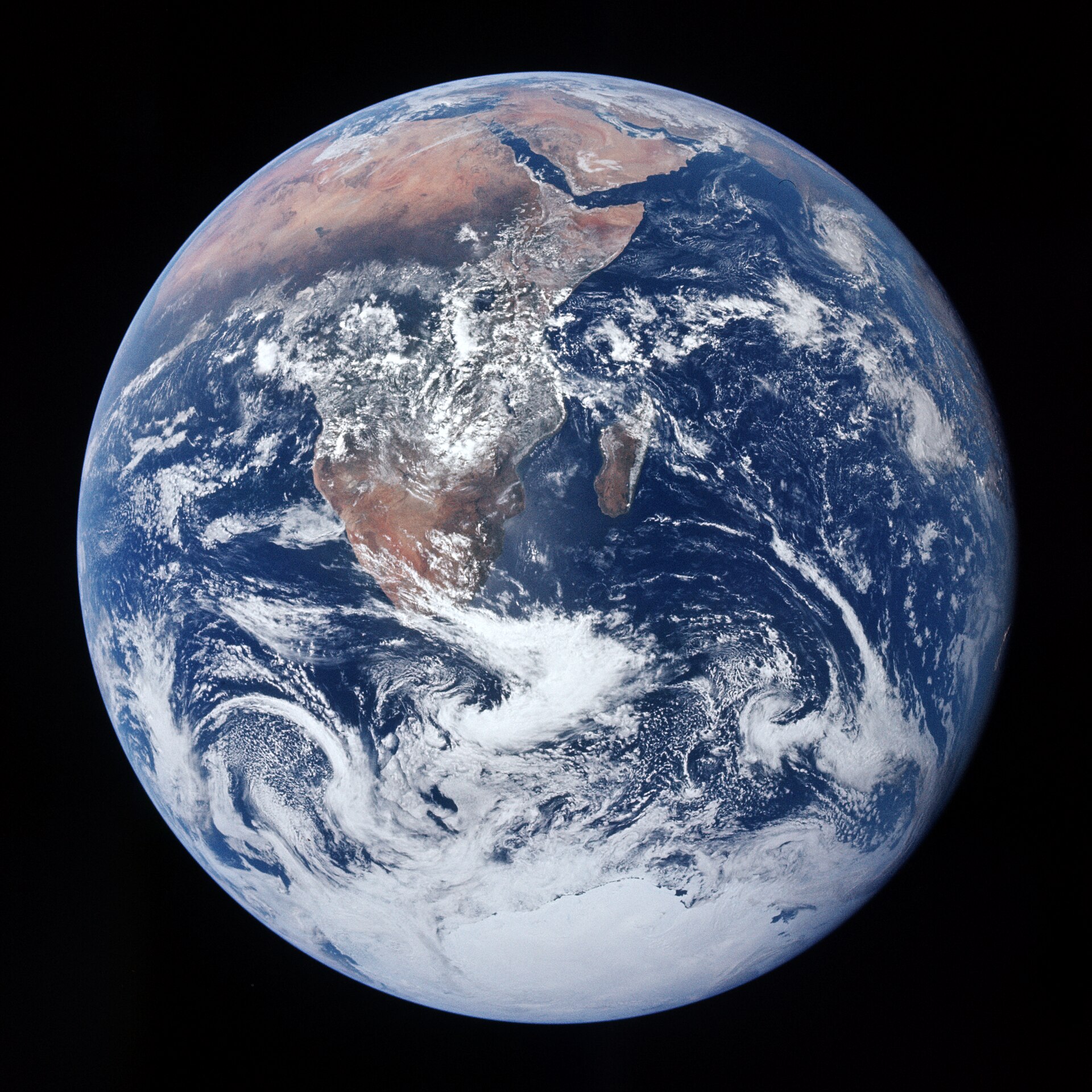 Earth seen whole from Apollo 17, blue oceans and swirling white cloud, the one planet we know of that ticks every box