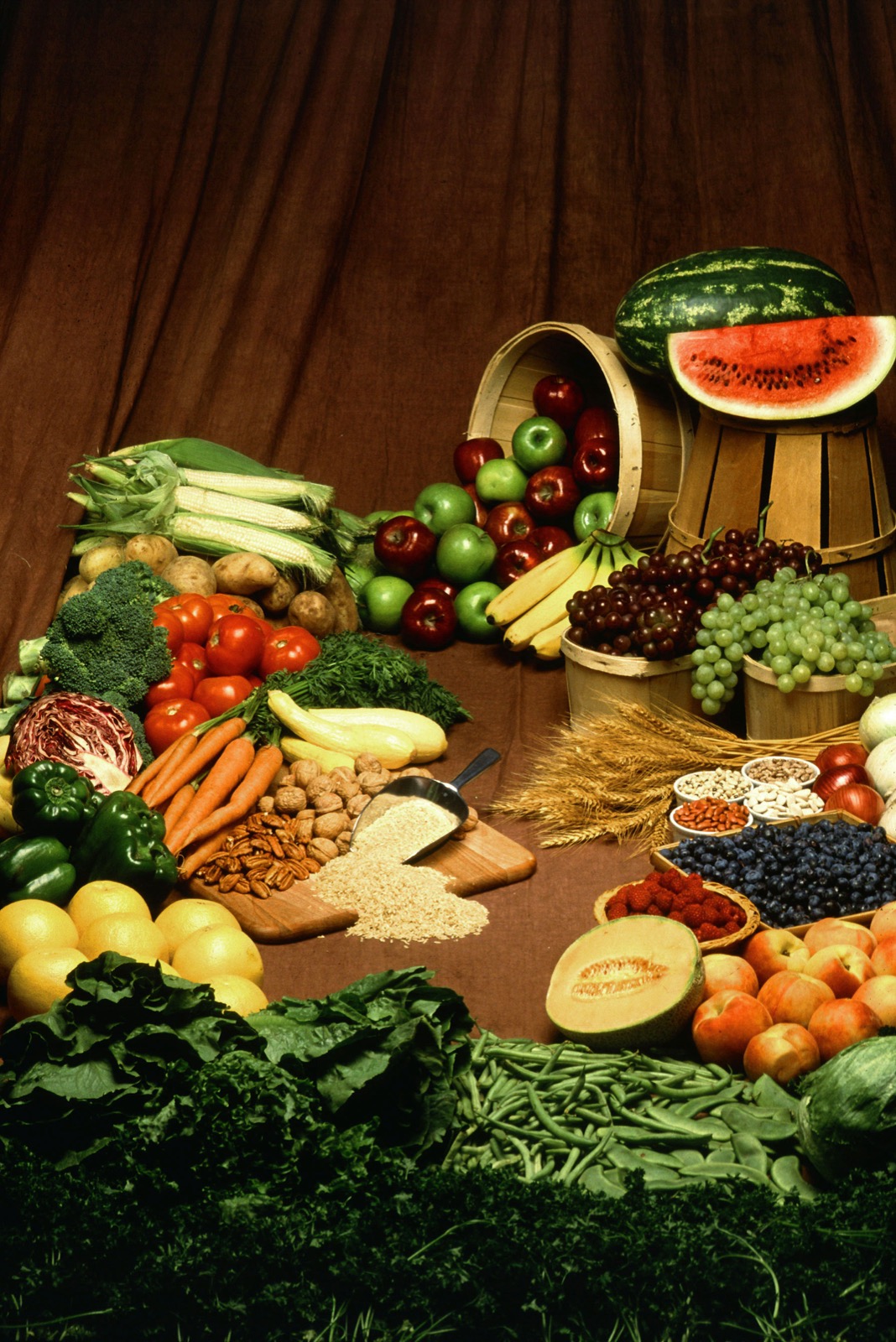 A spread of high-fibre foods, vegetables, fruit, wholegrains, nuts and seeds, the kind of food that keeps digestion healthy.