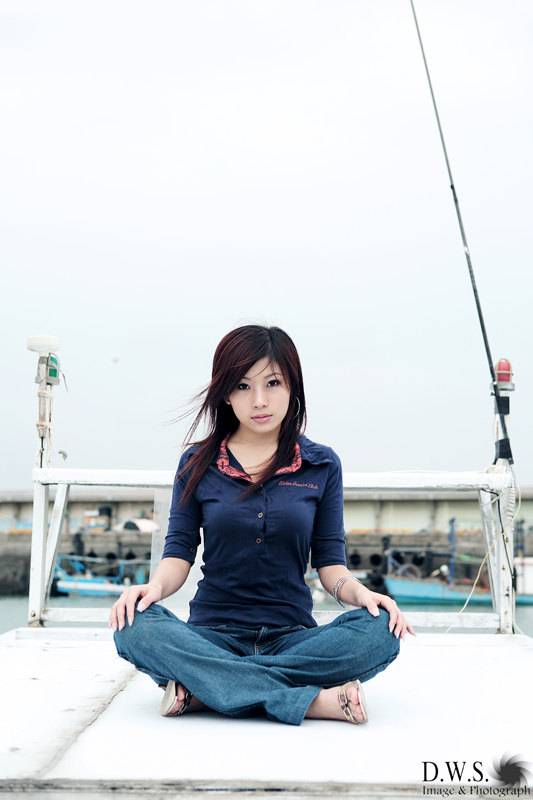 Someone sitting cross-legged, the kind of position that can make a foot 'go to sleep'.