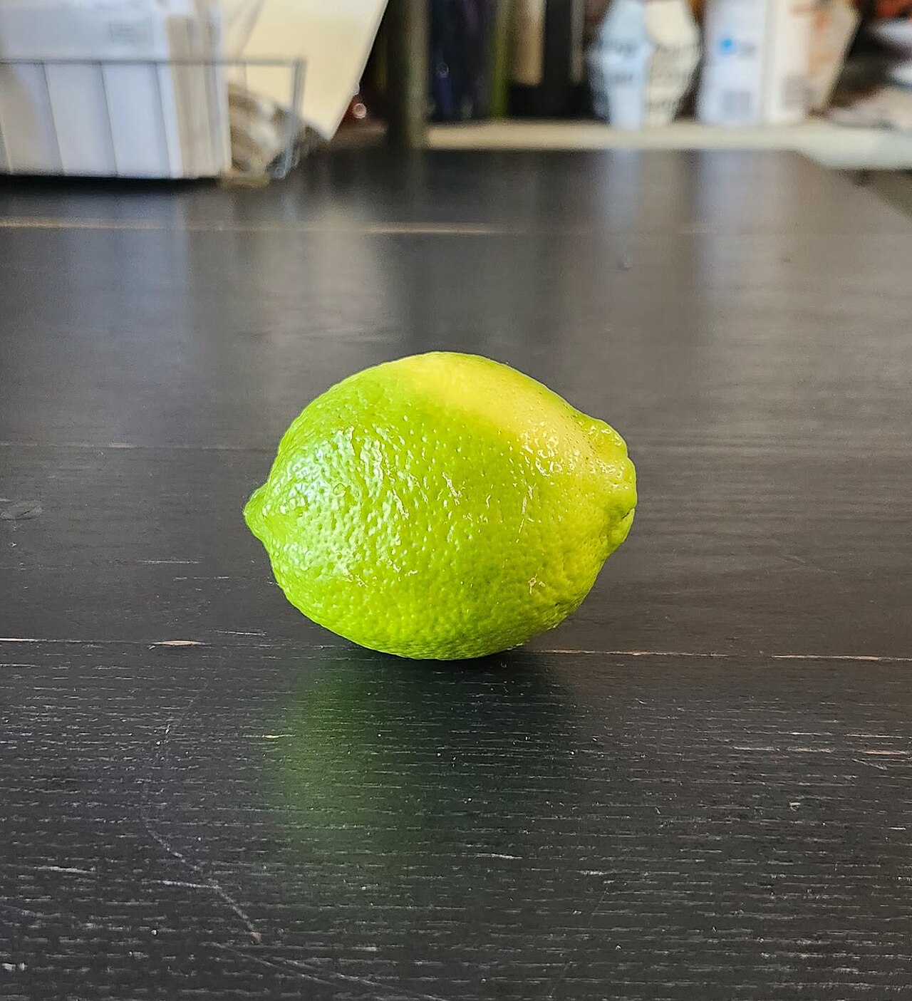 A fresh lemon, its juice is a mild acid