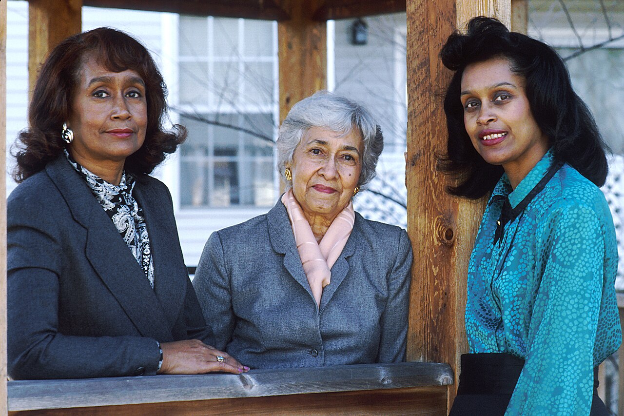 Three generations of one family, sharing features passed down through their genes.