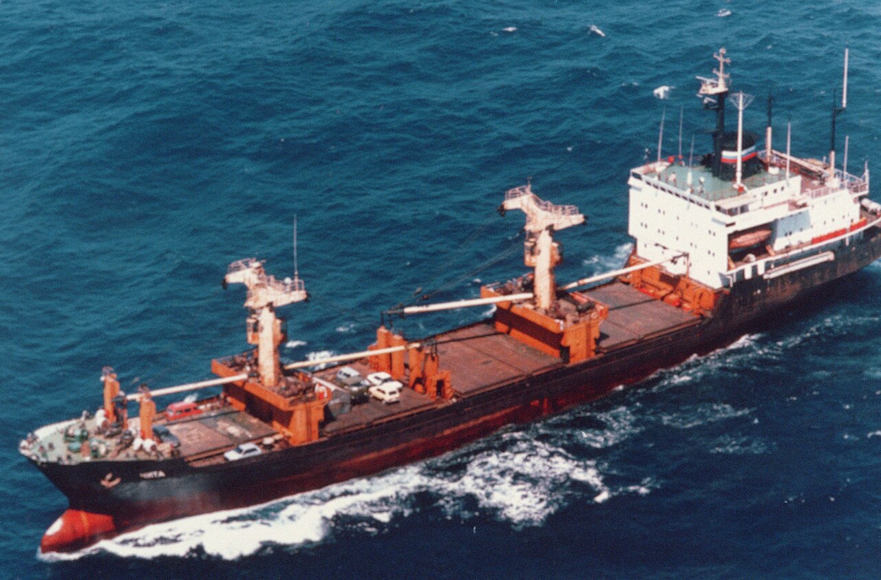A heavily loaded merchant container ship under way at sea