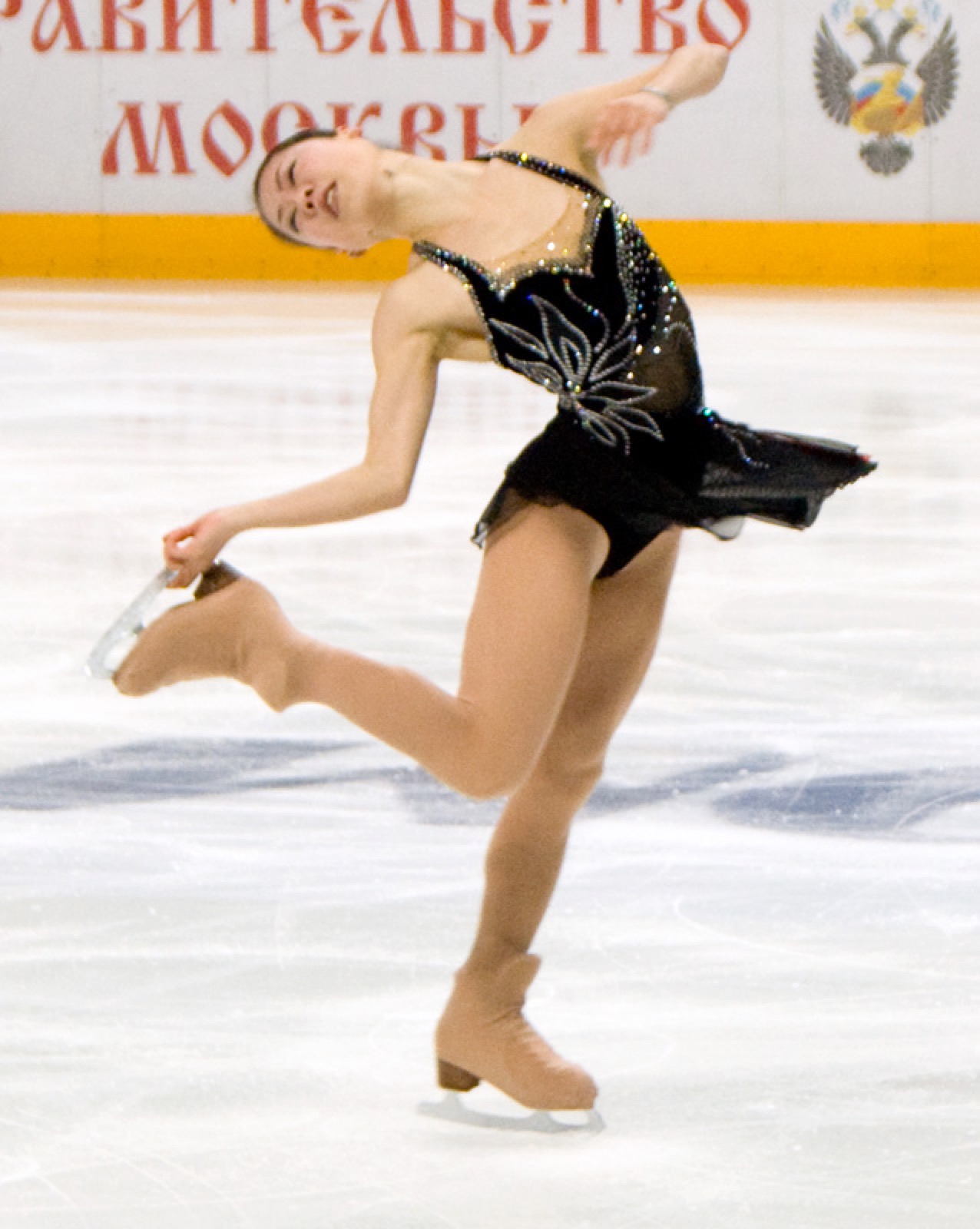 A figure skater spinning on the ice.