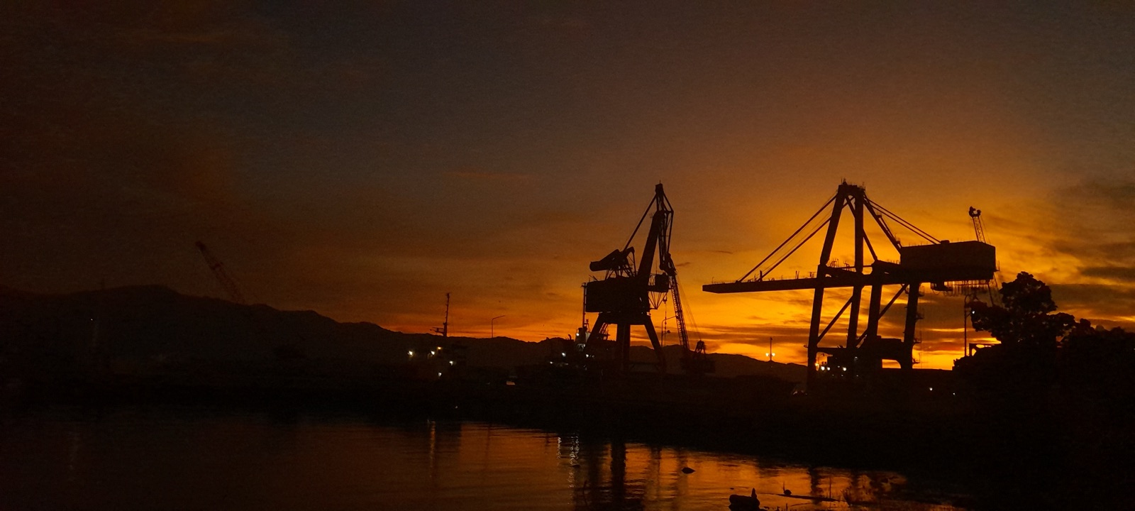 A glowing orange twilight sky as day fades into night
